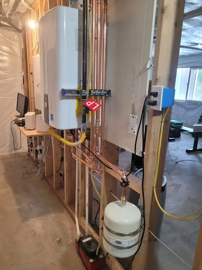 Licensed plumber repairing a kitchen sink in Hackensack
